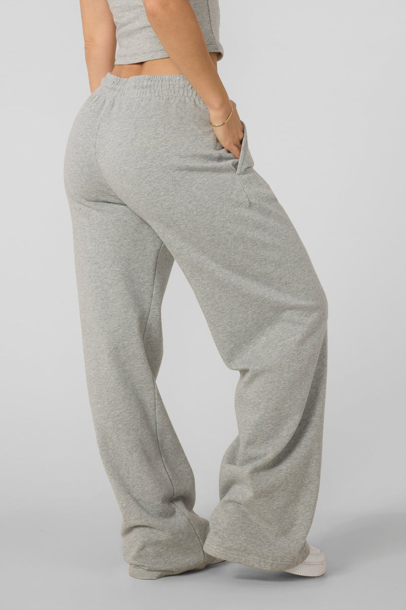 W281 Flashback Joggers- Lightweight, breathable 2000-inspired joggers with a bold airbrushed logo, oversized low-rise fit, and adjustable drawstrings for comfort and style in Heather Grey