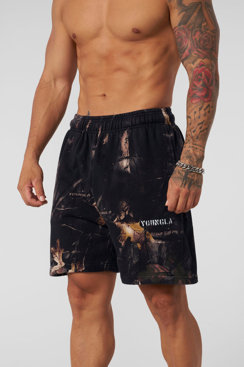 1076 - Tree Camo Collection - Shorts, with relaxed fit and stitched hem, ideal for training, lounging, or casual wear in Black color.
