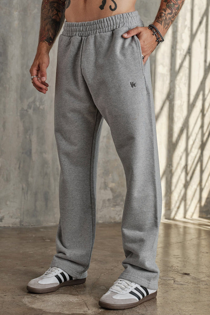 2068 - Elevated Essentials - Straight Sweats— premium heavyweight cotton with a tailored, comfortable silhouette and minimal “Elevated” logo for versatile everyday wear in Heather Grey