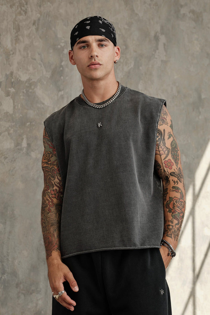 3035 - Elevated Essentials - Cut Offs - Relaxed fleece cut offs with raw-edge hems, lightweight premium cotton, small 'Elevated' logo in colour Grey Wash.