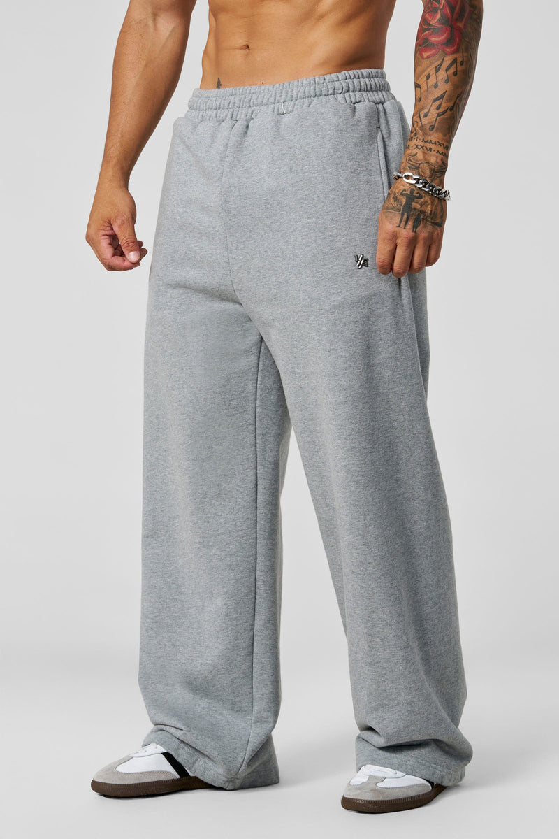 2067 - Elevated Essentials - Baggy Sweats - Baggy sweats in heavyweight cotton with relaxed silhouette, structured drape, soft feel, and subtle 'Elevated' detailing in colour Heather Grey.