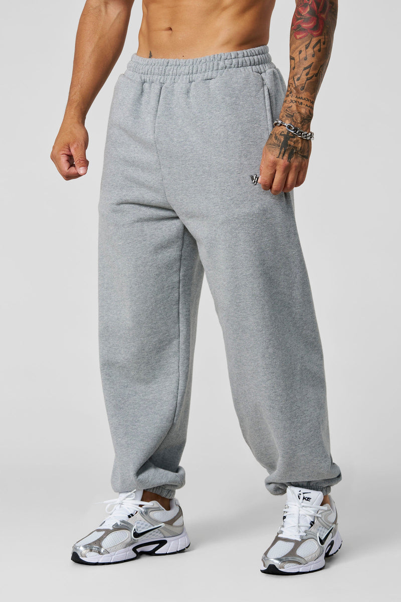 2069 - Elevated Essentials - Baggy Joggers — oversized, comfortable fit with cuffed ankles, structured heavyweight cotton, and subtle “Elevated” branding for a premium, versatile look in Heather Wash