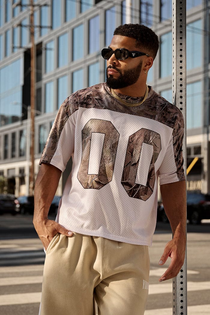 4237 - Double-Zero Jersey- Lightweight mesh jersey with retro sports design, double-zero numbers, and bold YOUNGLA branding on front and back, breathable and comfortable for all-day wear in Beige