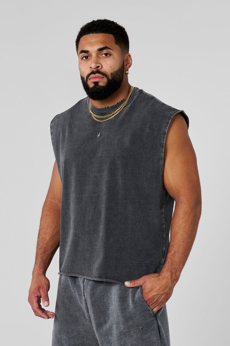3035 - Elevated Essentials - Cut Offs - Relaxed fleece cut offs with raw-edge hems, lightweight premium cotton, small 'Elevated' logo in colour Grey Wash.