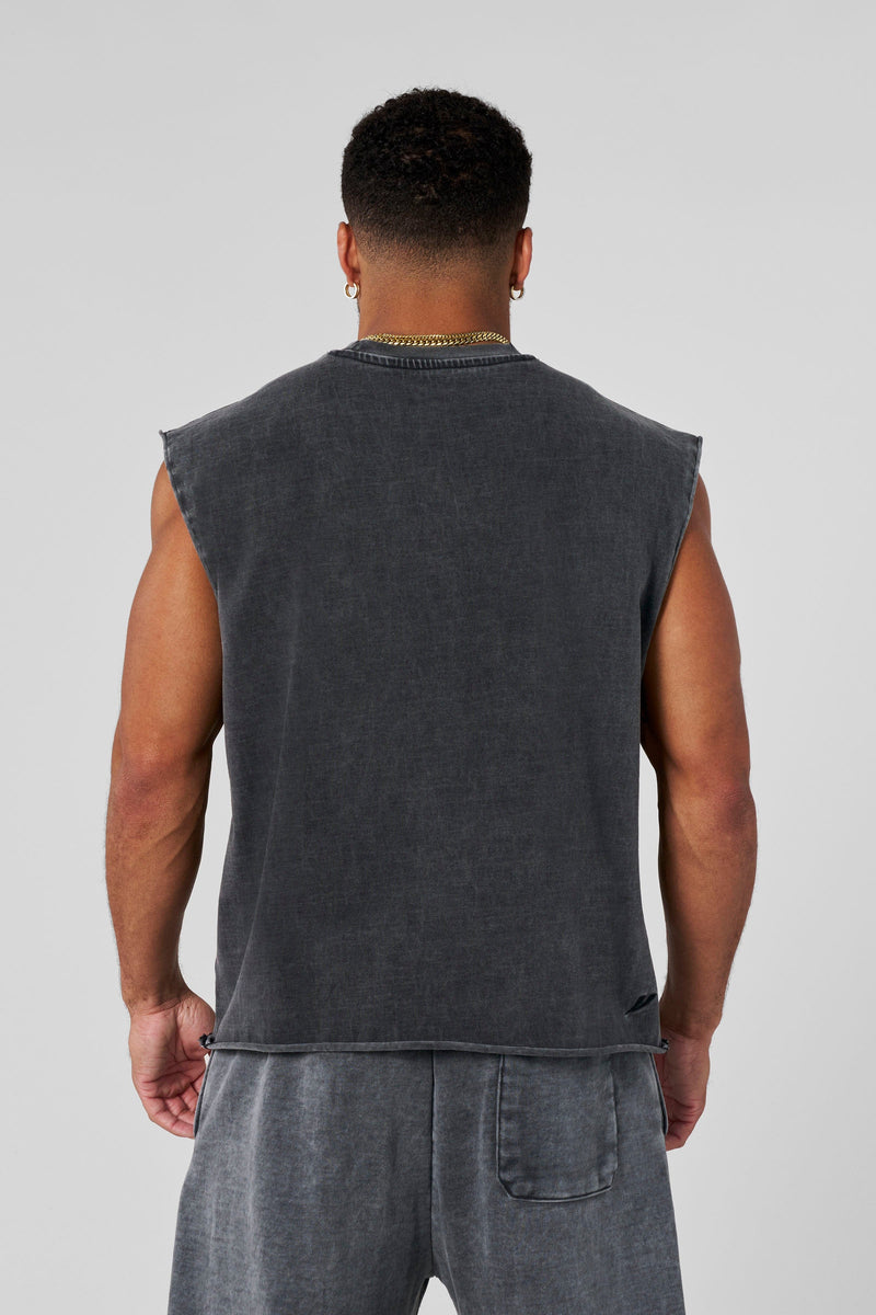 3035 - Elevated Essentials - Cut Offs - Relaxed fleece cut offs with raw-edge hems, lightweight premium cotton, small 'Elevated' logo in colour Grey Wash.