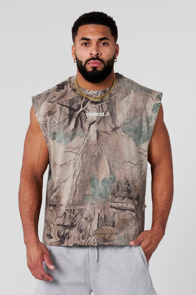 3067 - Tree Camo Collection - Cut Offs - heavyweight terry shorts with raw hems and an above-the-knee fit in colour Beige Tree Camo.