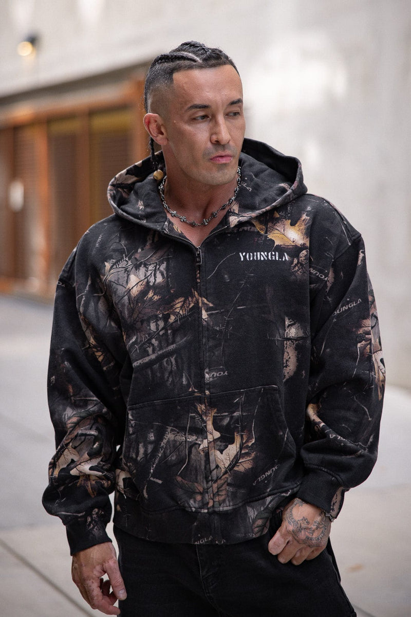 5116 - Tree Camo Collection - Zip Ups - versatile zip-up hoodie with a structured hood, durable zipper, and roomy fit in colour Black Tree Camo.