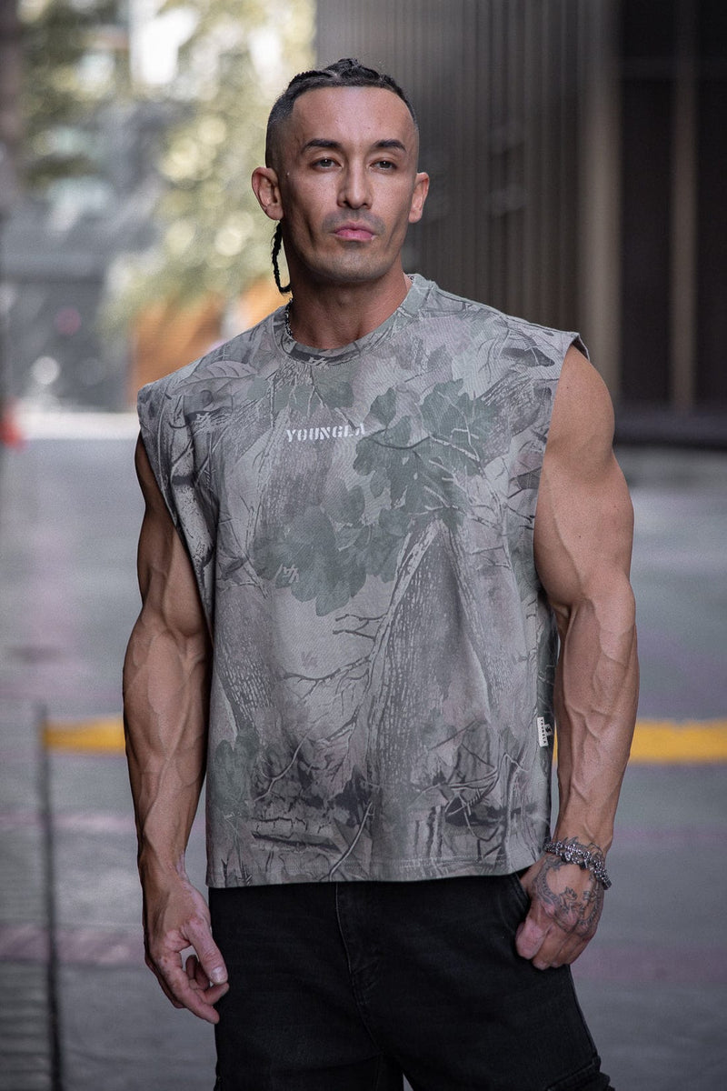 3067 - Tree Camo Collection - Cut Offs - heavyweight terry shorts with raw hems and an above-the-knee fit.