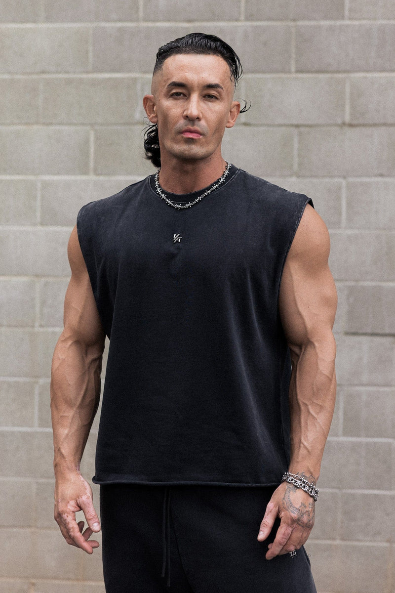 3035 - Elevated Essentials - Cut Offs - Relaxed fleece cut offs with raw-edge hems, lightweight premium cotton, small 'Elevated' logo in colour Black Wash.