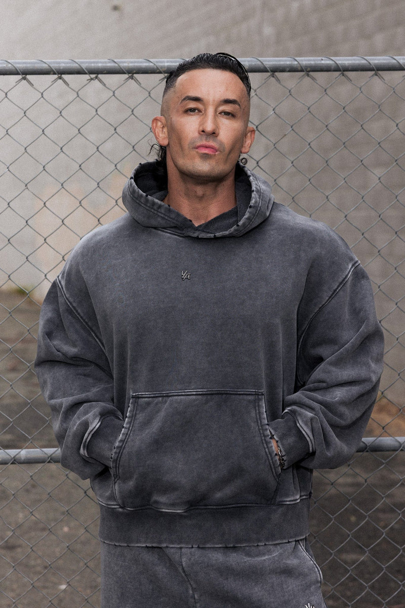 5096 - Elevated Essentials - Pullover Hoodies - Heavyweight cotton hoodie with a spacious fit, kangaroo pocket, and adjustable hood. Subtle 'Elevated' branding for a versatile, modern look in Grey Wash.