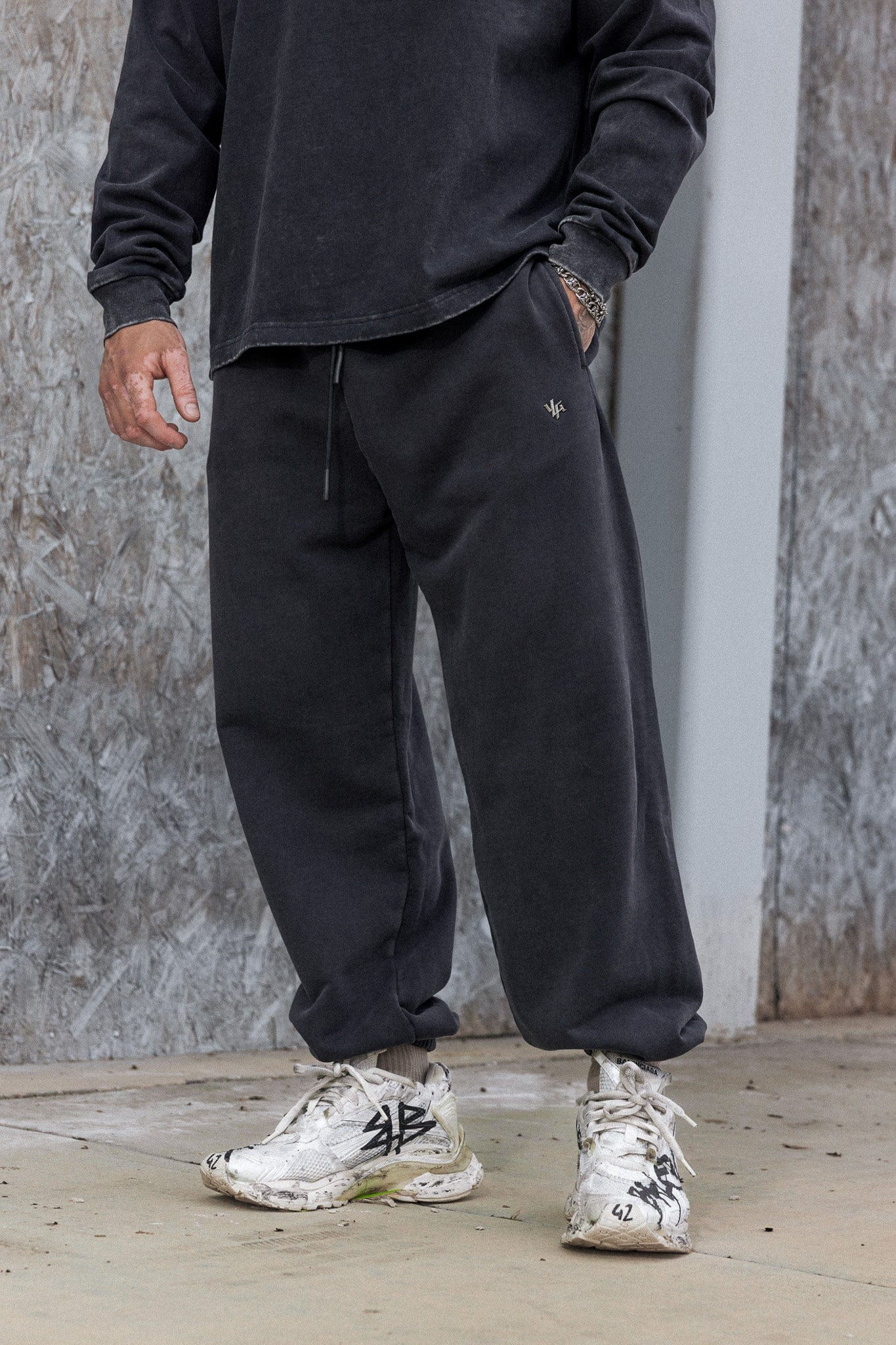2069 - Elevated Essentials - Baggy Joggers — oversized, comfortable fit with cuffed ankles, structured heavyweight cotton, and subtle “Elevated” branding for a premium, versatile look in Black Wash