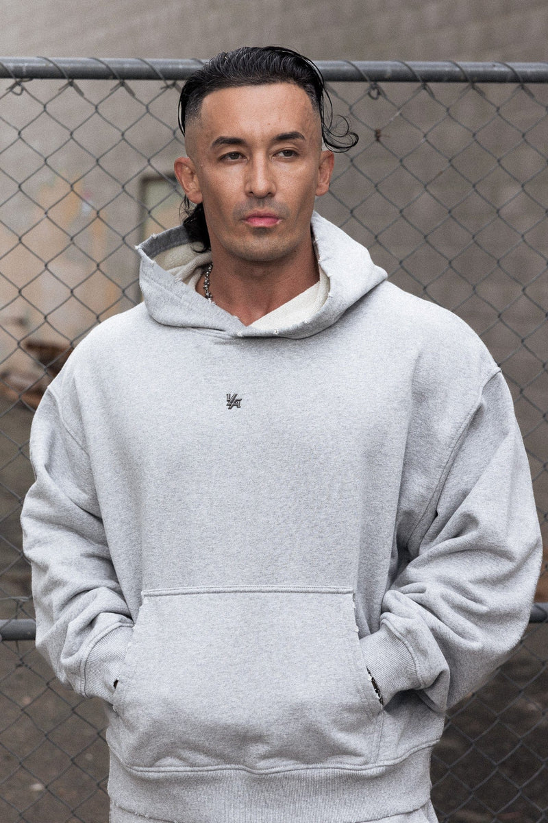 5096 - Elevated Essentials - Pullover Hoodies - Heavyweight cotton hoodie with a spacious fit, kangaroo pocket, and adjustable hood. Subtle 'Elevated' branding for a versatile, modern look in Heather Grey.