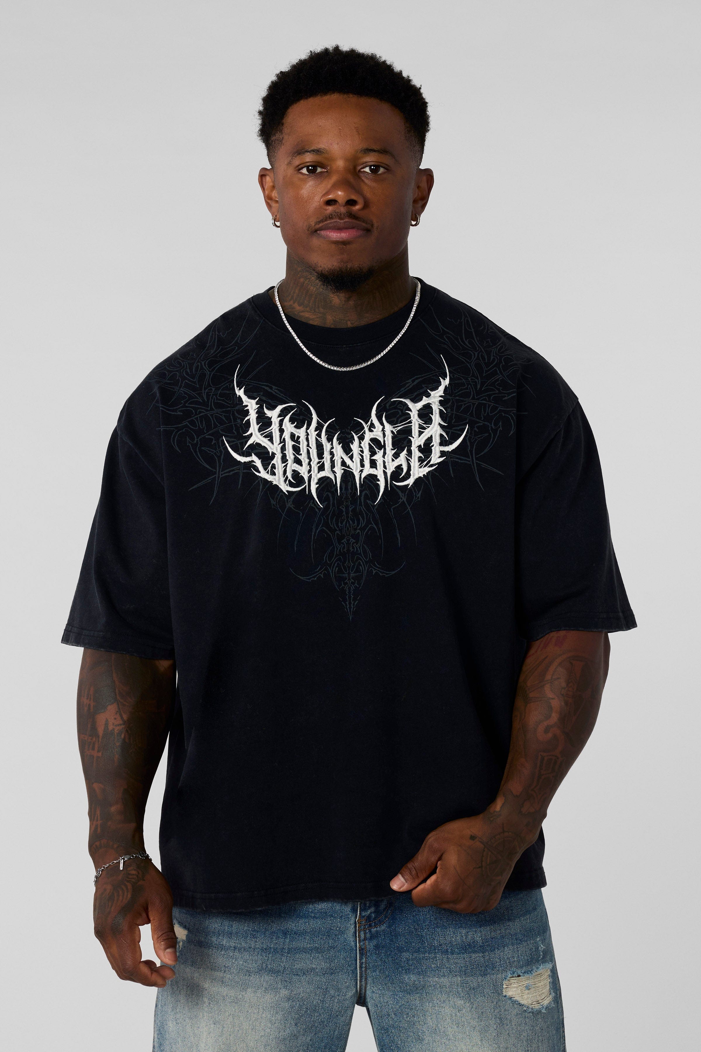 4149 - Gothic Tees- Oversized tee with bold gothic-inspired graphics on the back, structured yet comfortable, offering a sharp, wearable edge and statement-making style in Black Wash