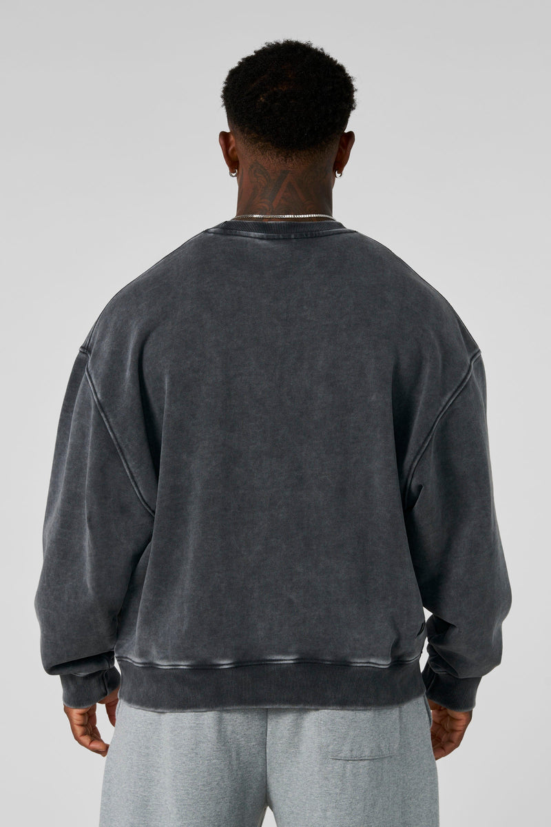 5095 - Elevated Essentials - Crewneck - Heavyweight cotton crewneck with a relaxed fit and ribbed cuffs. Soft interior and minimal 'Elevated' branding for a comfortable, premium everyday essential in Grey Wash.