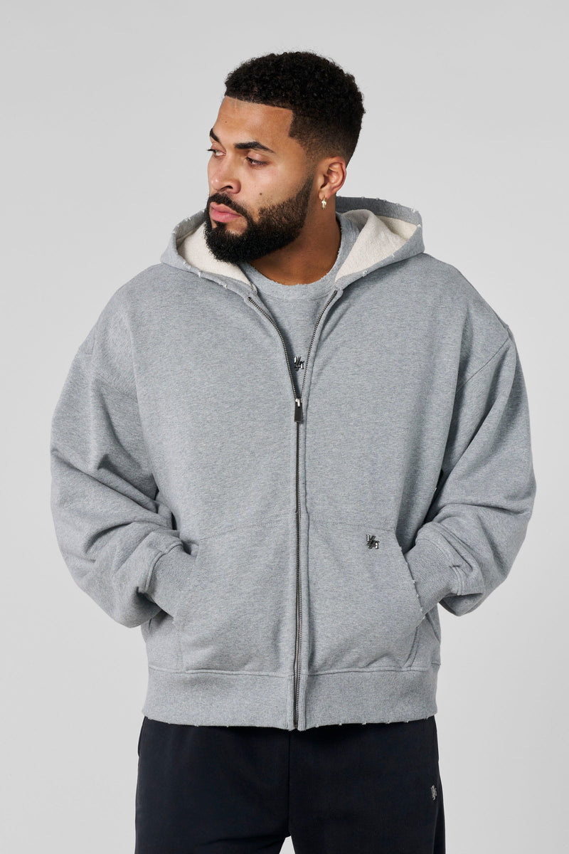 5102 - Elevated Essentials - Zip-Ups - Full-zip heavyweight terry cotton hoodie with front pockets, ribbed finishes, smooth zipper, and minimal 'Elevated' print in colour Heather Grey.