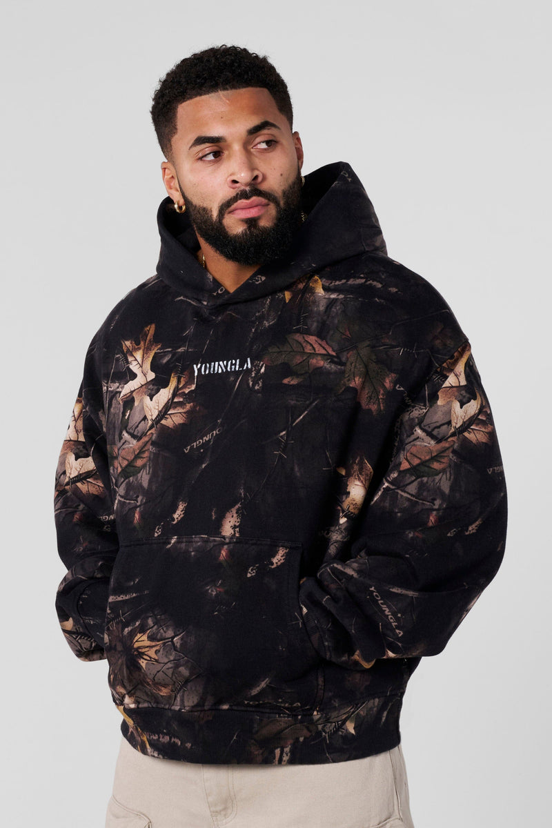 5117 - Tree Camo Collection - Pullover Hoodies - Tree Camo Pullover – plush terry, relaxed fit, kangaroo pocket, comfortable everyday style in Black Tree Camo.