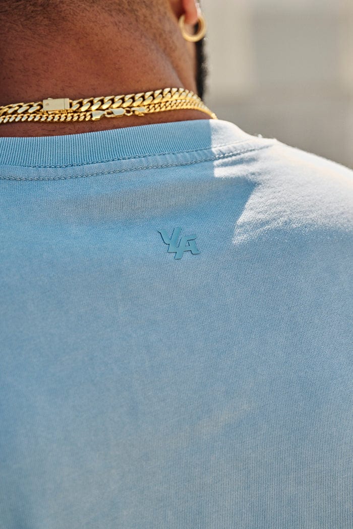 4219 - Summer Peached Tees— buttery-soft, durable, and laid-back fit, perfect for everyday layering and repeated wear in Light Blue Wash
