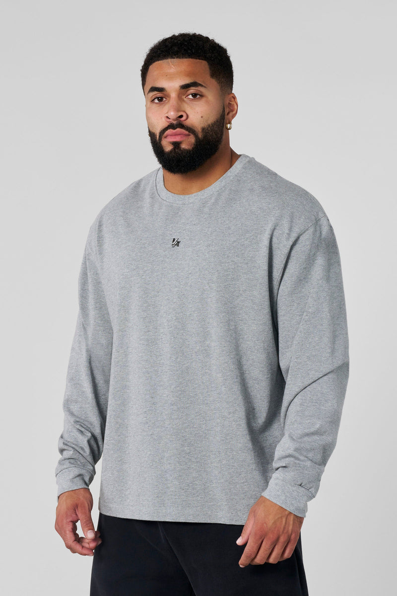 8001 - Elevated Essentials - Longsleeves - Midweight cotton long sleeve with ribbed cuffs and minimal 'Elevated' branding. Durable, comfortable, and perfect for year-round wear in Heather Grey.