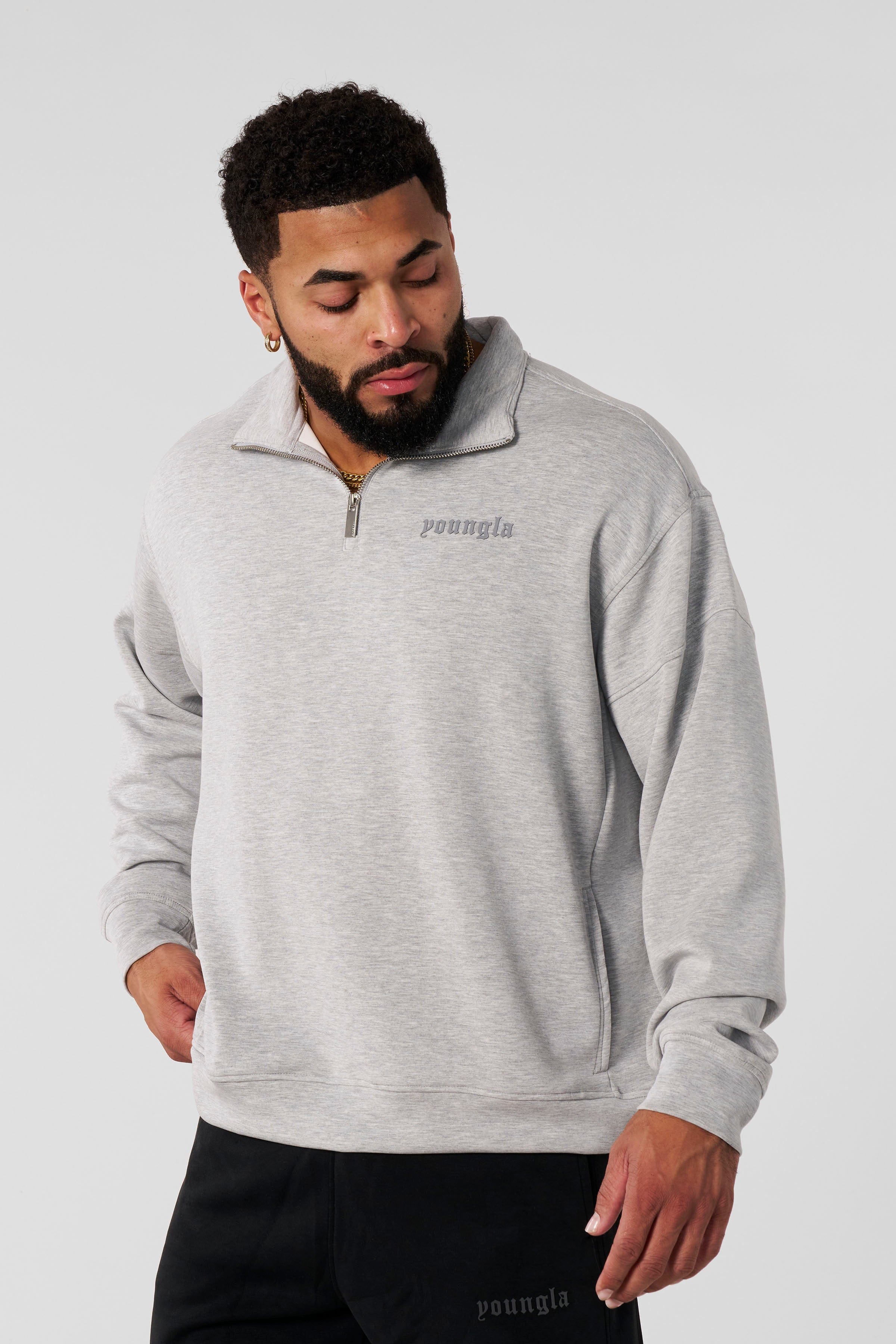8065 - Soft AF Quarter Zips - lightweight, flexible, stand-up collar, smooth zipper, tailored fit for workouts, layering, or casual wear in Heather grey.