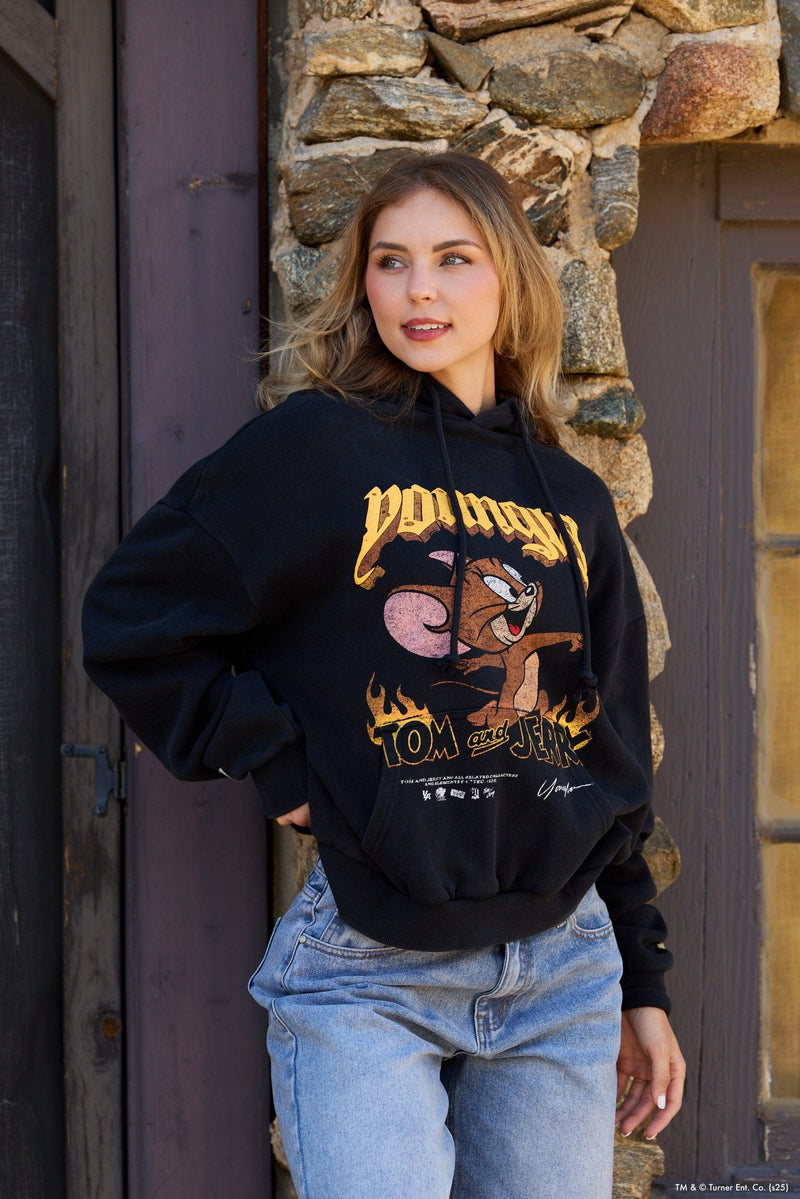 W528 Tom & Jerry Oversized Hoodie - Ultra-soft, washed tee with exclusive graphics for a unique, lived-in look. Perfect for lounging or layering with effortless style in Black/Yellow.