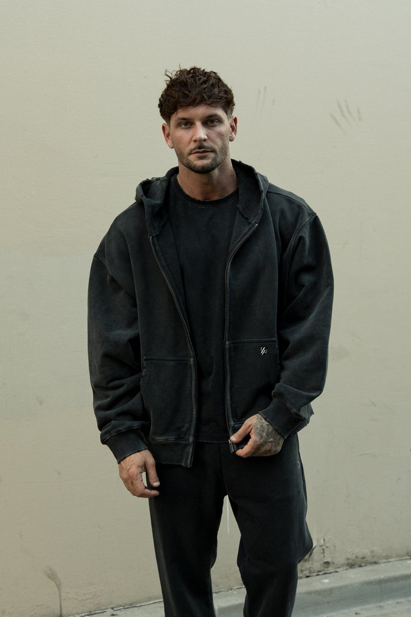 5102 - Elevated Essentials - Zip-Ups - Full-zip heavyweight terry cotton hoodie with front pockets, ribbed finishes, smooth zipper, and minimal 'Elevated' print in colour Black Wash.