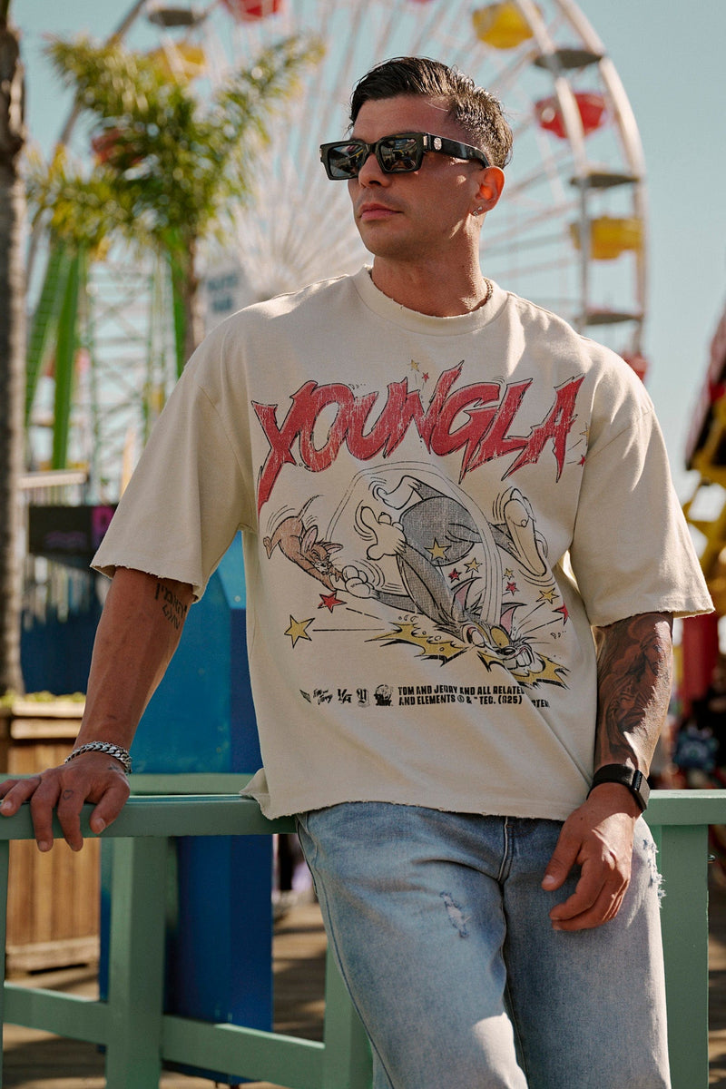 4082 - Tom & Jerry Tees- Tom & Jerry oversized cotton tee featuring bold throwback graphics of classic cartoon scenes, midweight and collectible – Fight Time design