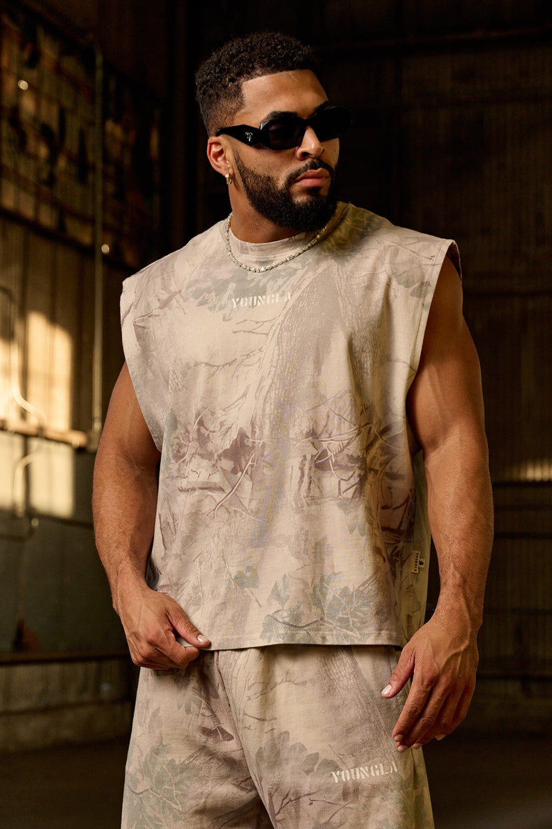 3067 - Tree Camo Collection - Cut Offs - heavyweight terry shorts with raw hems and an above-the-knee fit in colour Beige Tree Camo.