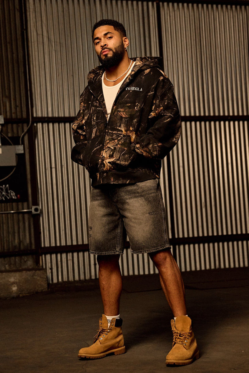 5116 - Tree Camo Collection - Zip Ups - versatile zip-up hoodie with a structured hood, durable zipper, and roomy fit in colour Black Tree Camo.