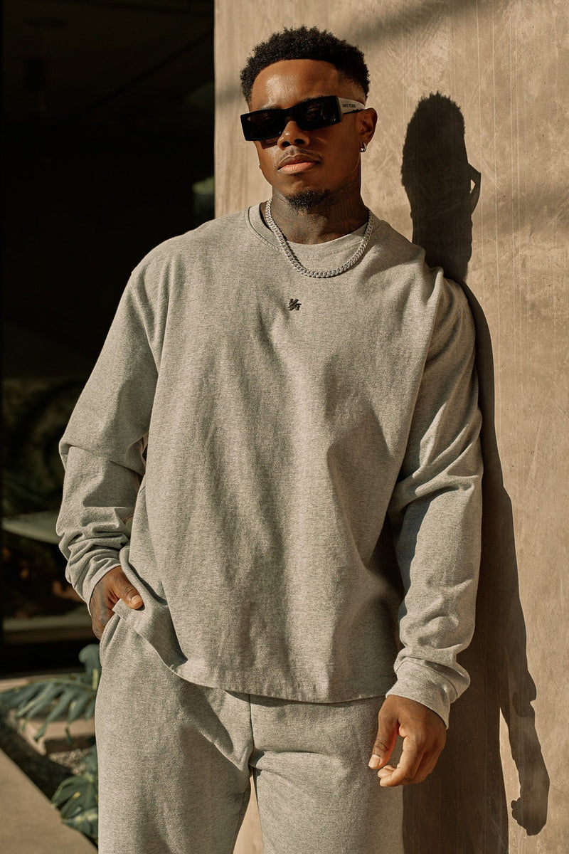 8001 - Elevated Essentials - Longsleeves - Midweight cotton long sleeve with ribbed cuffs and minimal 'Elevated' branding. Durable, comfortable, and perfect for year-round wear in Heather Grey.