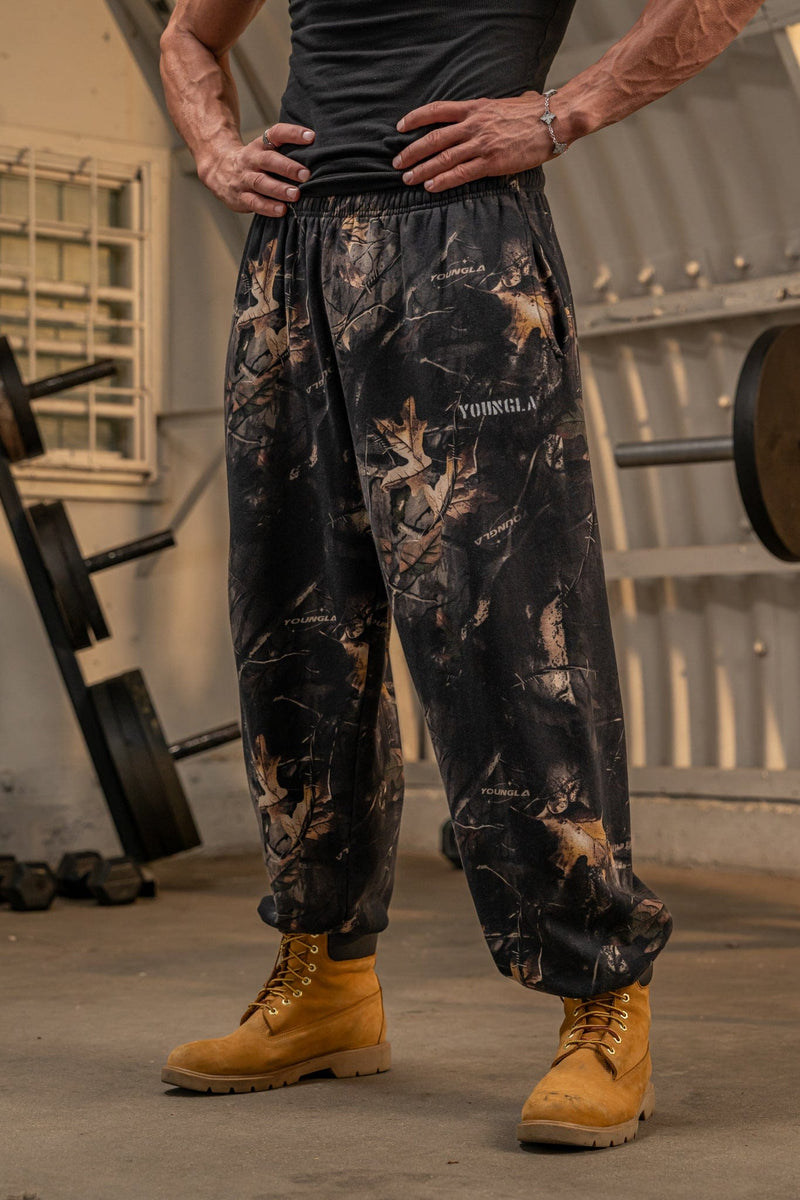 2063 Tree Camo Baggy Joggers — oversized, street-ready comfort with elastic cuffs, durable heavyweight terry, and a relaxed camo fit for everyday wear in Black.