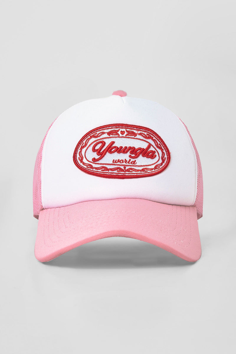 W636 Flashback Trucker Hat- Breathable mesh panels, embroidered patch logo, and adjustable snapback closure for a stylish, customizable fit in Light Pink