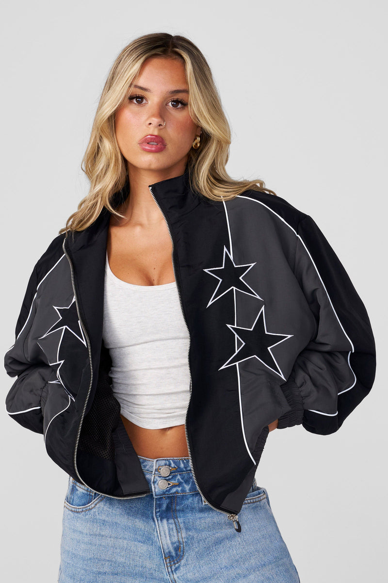 W565 Old School Windbreaker - Oversized vintage-style windbreaker with mesh lining and heavier weight fabric, retro-inspired style in colour Black.