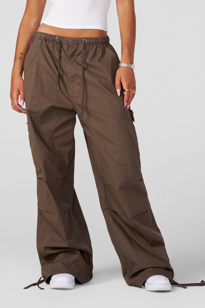 W283 Off-Duty pants- Off Duty Baggy Pants in soft, breathable cotton with oversized fit, adjustable ankle ties, and drawstring waist, combining relaxed comfort with street-ready style in Olive