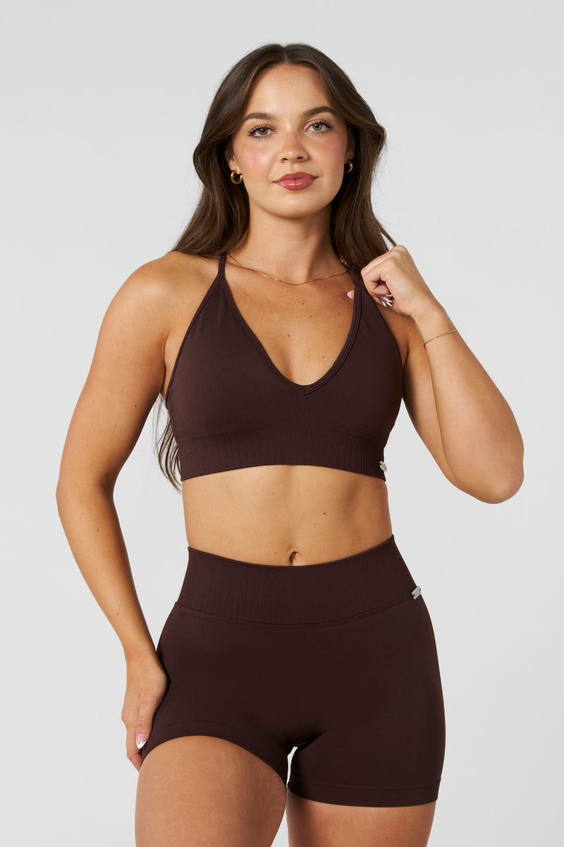 W367 - Sculpt Seamless Plunge Bra - Medium Impact Bra — ultra-soft seamless design with a flattering deep V-neckline and removable padding for adjustable support in colour Brown.