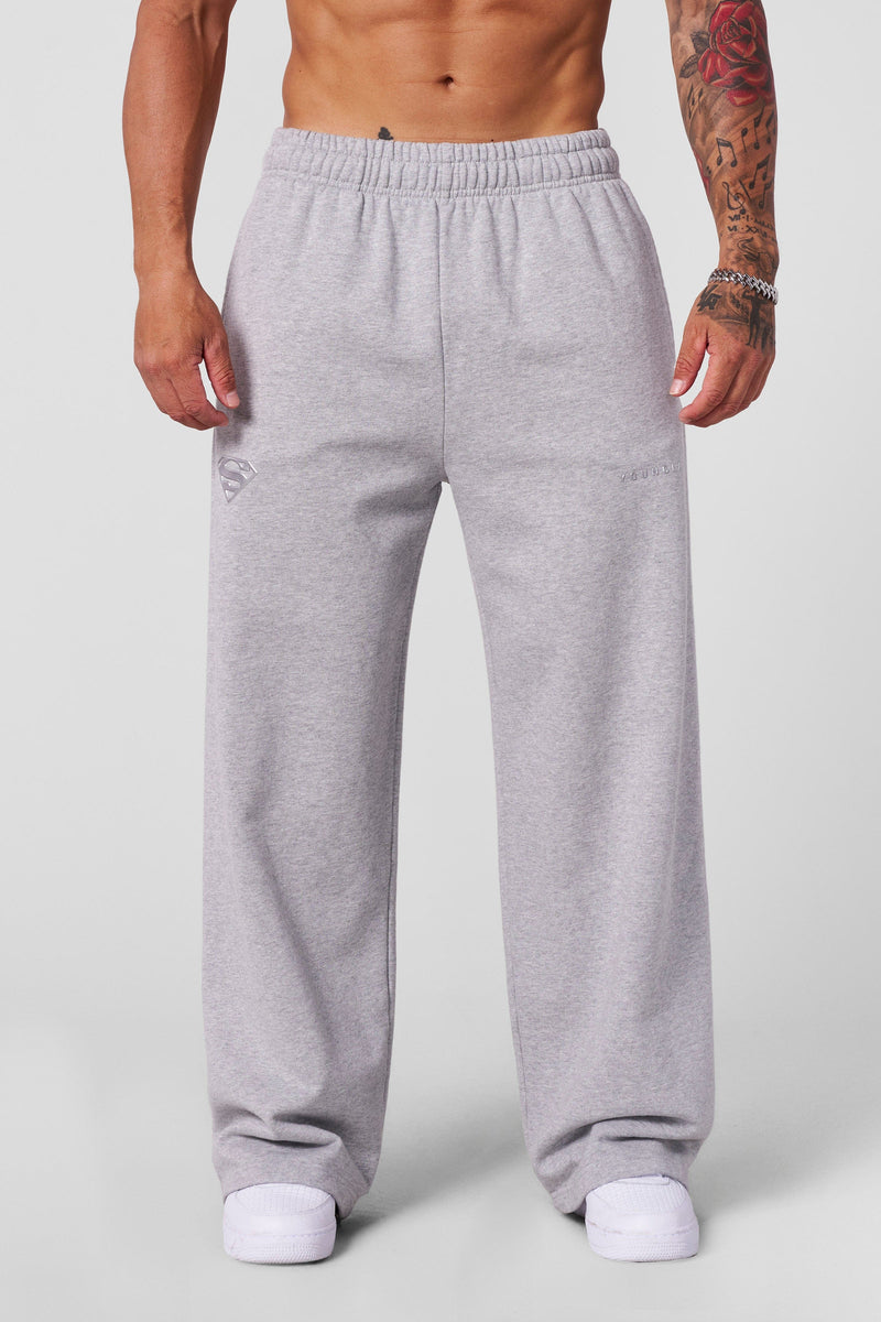 2032 - Superman Sweats - Man of Steel sweatpants from Superman x YoungLA collaboration, acid-wash design, YoungLA chrome logo on left leg, Superman logo on right, baggy fit for comfortable everyday wear in Heather Grey 