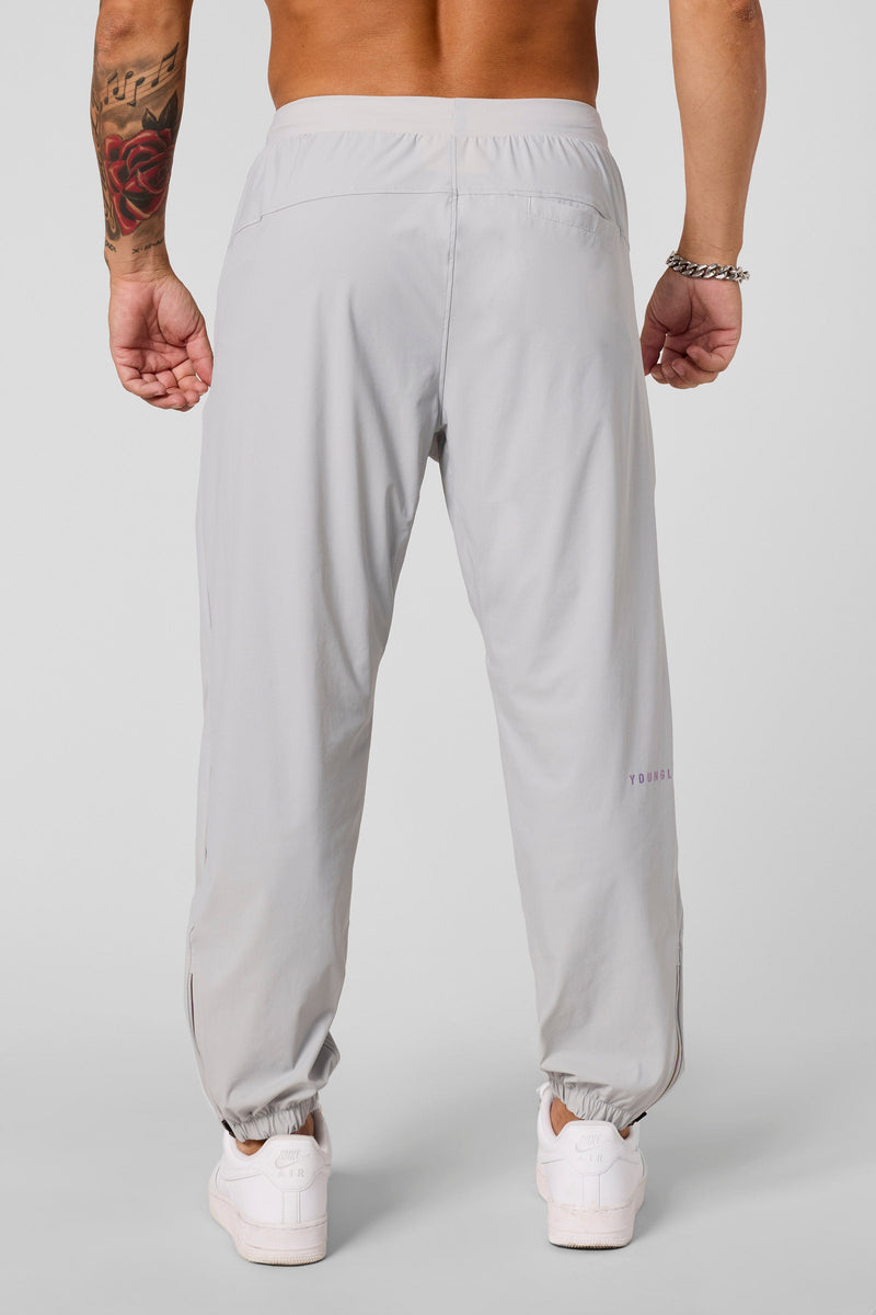 2045 - Ultimate Workout Joggers - Loose-fit, lightweight joggers designed for comfort and unrestricted movement. Breathable and versatile—perfect for the gym or everyday wear in Light Grey.