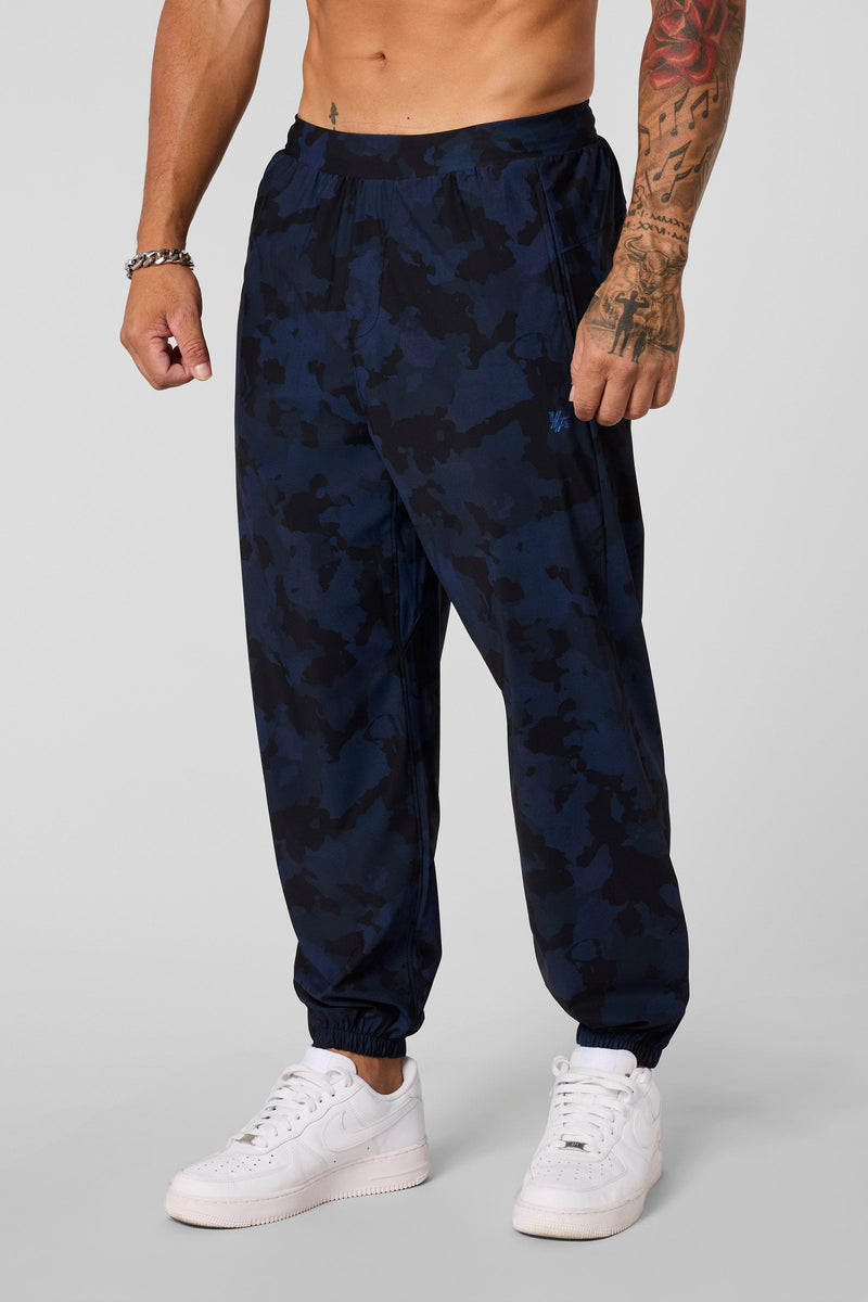 2045 - Ultimate Workout Joggers - Loose-fit, lightweight joggers designed for comfort and unrestricted movement. Breathable and versatile—perfect for the gym or everyday wear in Navy Black Camo.