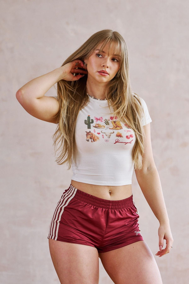 W401 Vintage Baby tee- Vintage-inspired fitted baby tee with unique graphics in four colors, offering a flattering throwback style for easy mixing and matching in White
