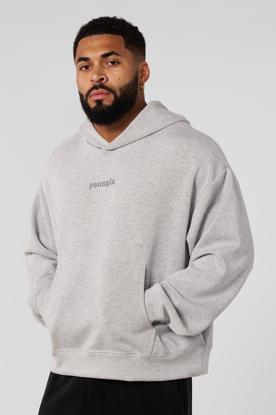 5216 Soft AF Pullover, plush and lightweight with a modern cut and front pocket — comfortable and stylish for layering or solo wear in color Heather Grey