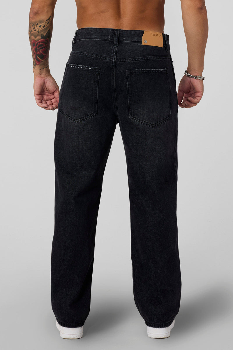 6025 - Straight Fit Ripped Jeans- Straight-leg jeans made from heavy 415 GSM cotton, structured yet softening over time, featuring minimal detailing for a vintage-inspired, timeless look in Black Wash.