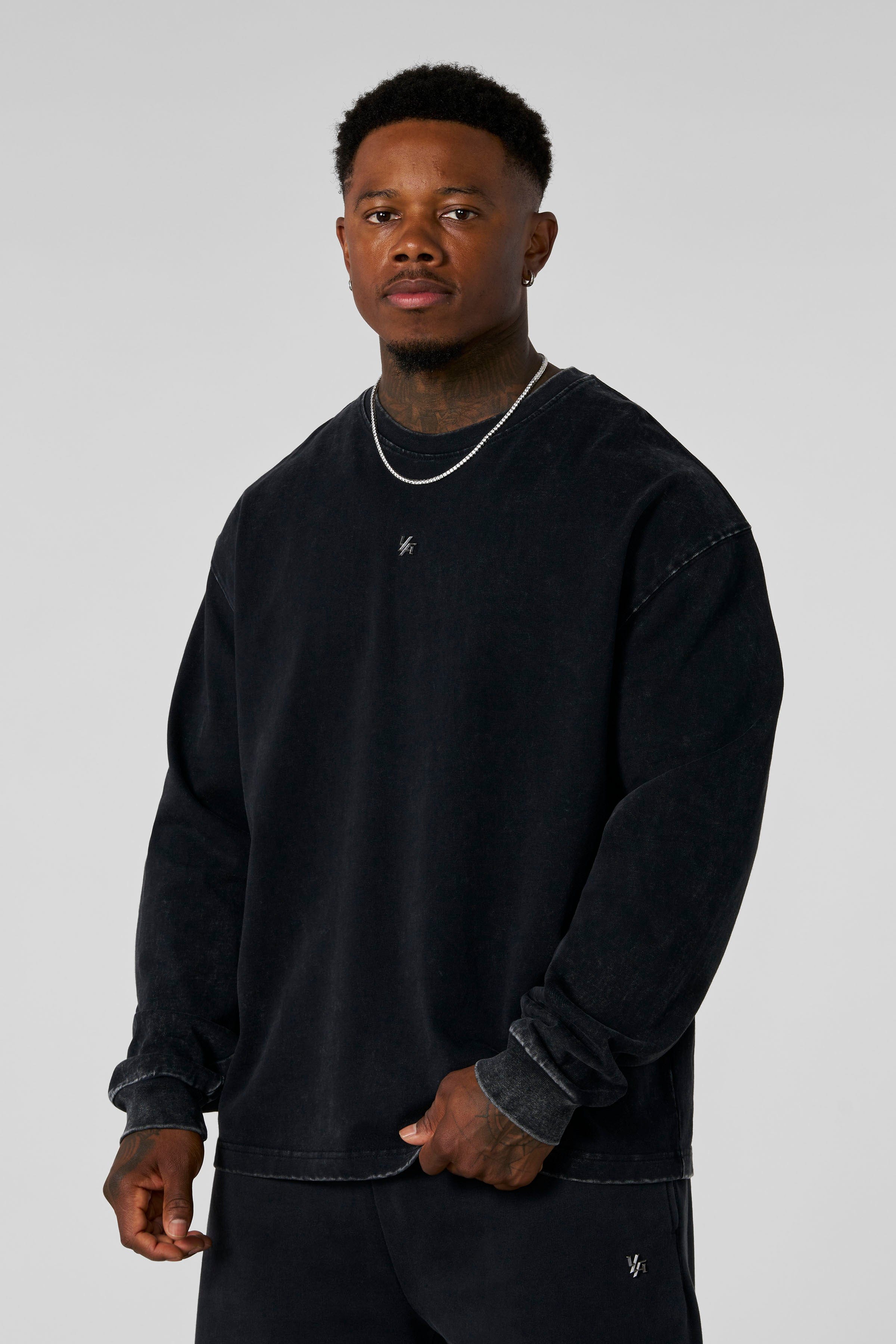 8001 - Elevated Essentials - Longsleeves -  Midweight cotton long sleeve with ribbed cuffs and minimal 'Elevated' branding. Durable, comfortable, and perfect for year-round wear in Black Wash.