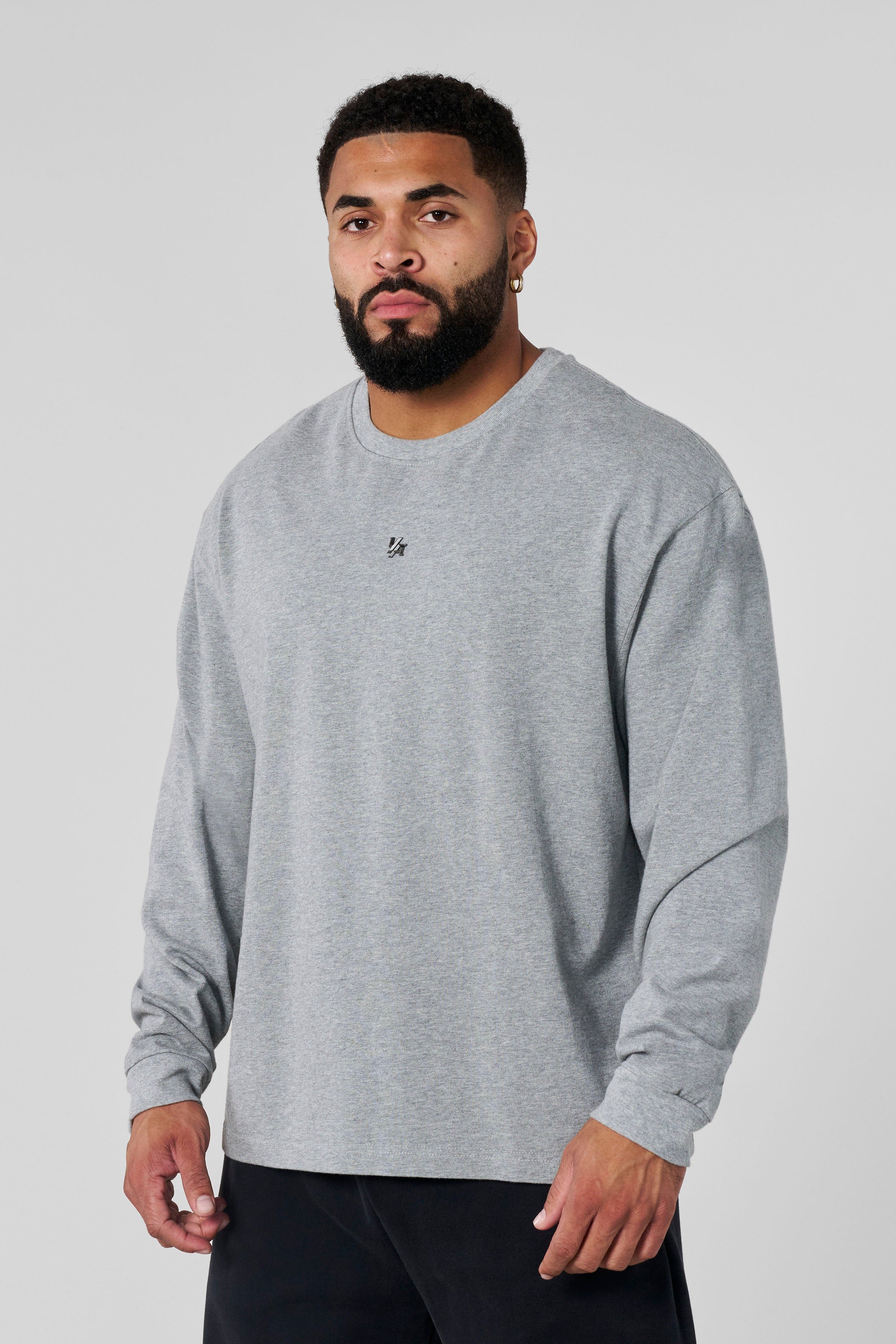 8001 - Elevated Essentials - Longsleeves -  Midweight cotton long sleeve with ribbed cuffs and minimal 'Elevated' branding. Durable, comfortable, and perfect for year-round wear in Heather Grey.