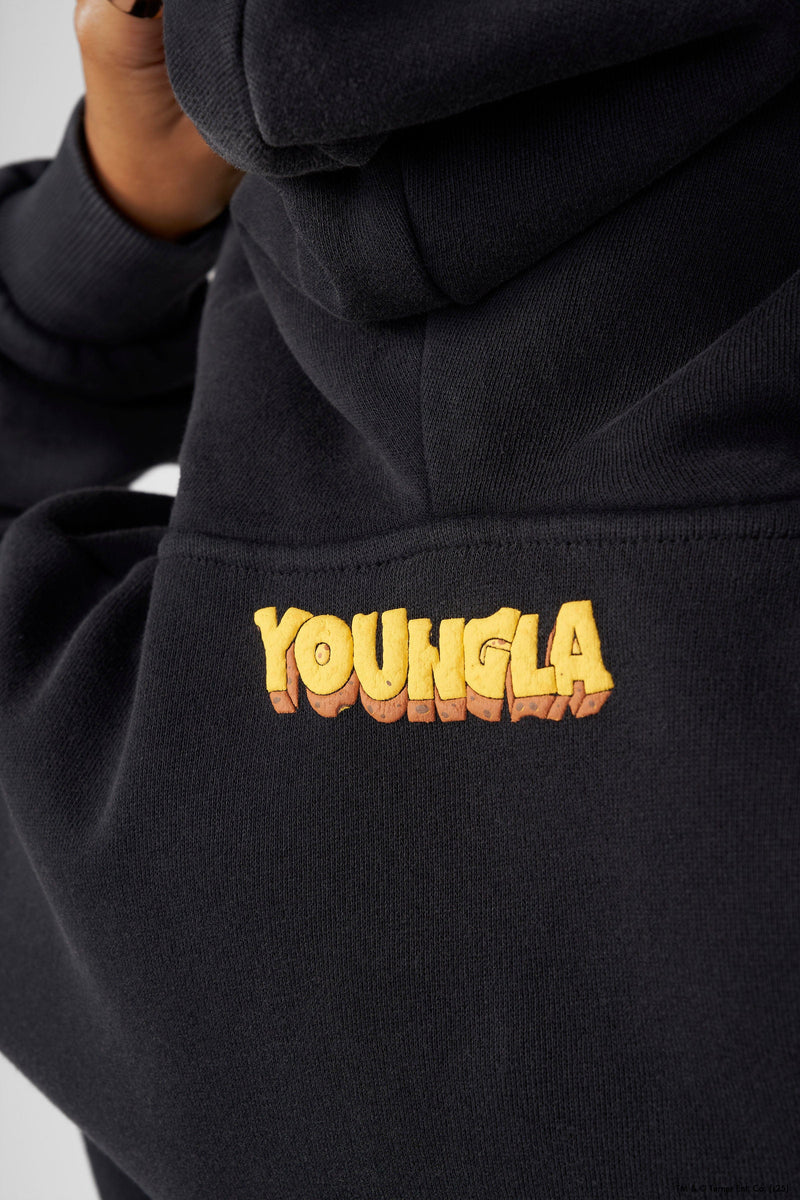 W528 Tom & Jerry Oversized Hoodie - Ultra-soft, washed tee with exclusive graphics for a unique, lived-in look. Perfect for lounging or layering with effortless style.