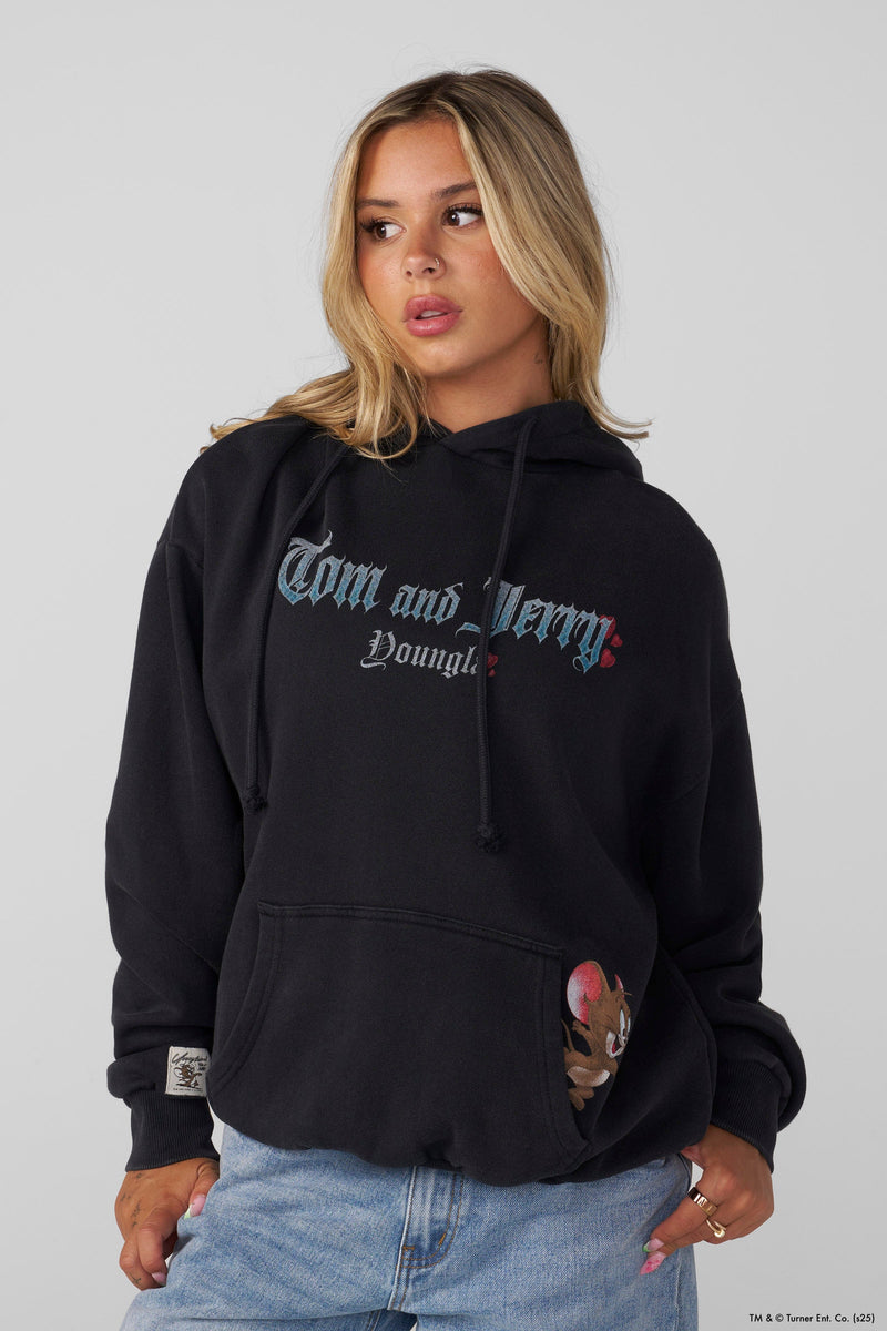 W528 Tom & Jerry Oversized Hoodie - Ultra-soft, washed tee with exclusive graphics for a unique, lived-in look. Perfect for lounging or layering with effortless style.