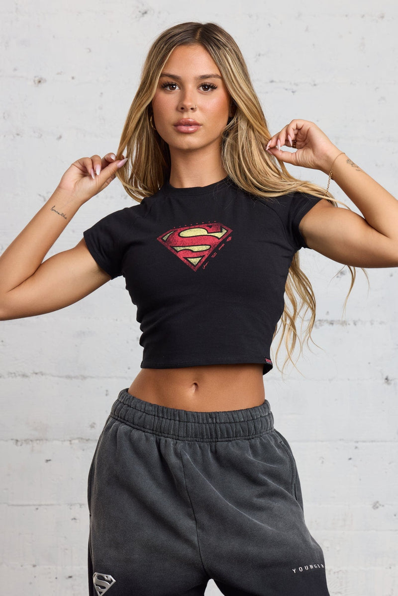 W492 Superman Baby Tee- Soft cotton hoodie with added stretch, designed to complement Superman straight-leg joggers, offering comfort and ease of movement in Black