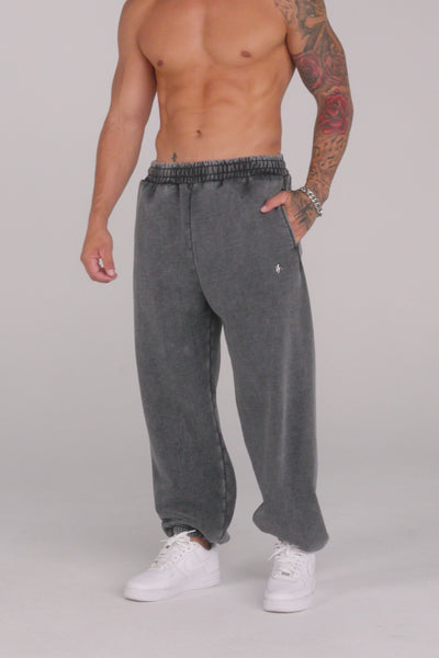 2069 - Elevated Essentials - Baggy Joggers — oversized, comfortable fit with cuffed ankles, structured heavyweight cotton, and subtle “Elevated” branding for a premium, versatile look.