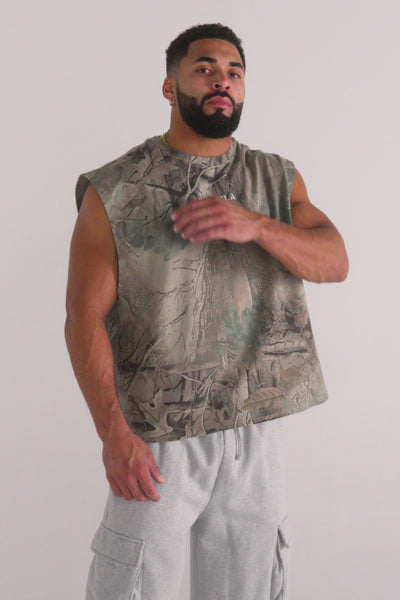 3067 - Tree Camo Collection - Cut Offs - heavyweight terry shorts with raw hems and an above-the-knee fit.